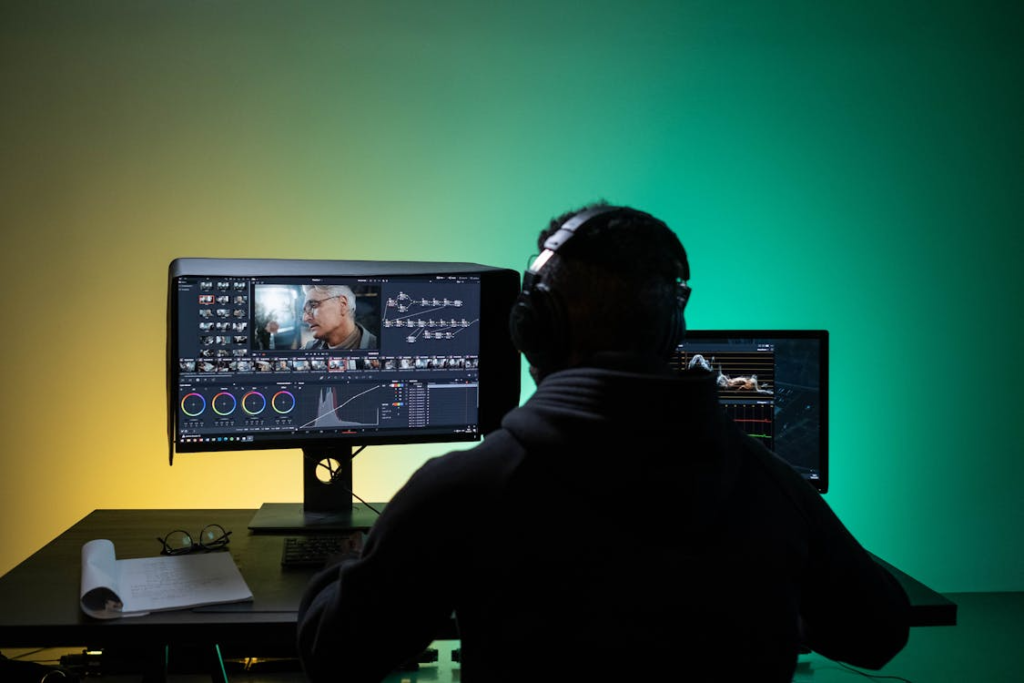 Creator editing videos on multiple screens